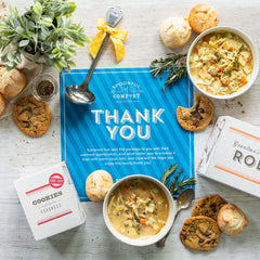 Thank You Care Package with soup, rolls and cookie displayed with included package insert with text "Thank You"
