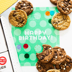 Close up of Birthday Cookie Comforts package insert with text "Happy Birthday" displayed around cookies